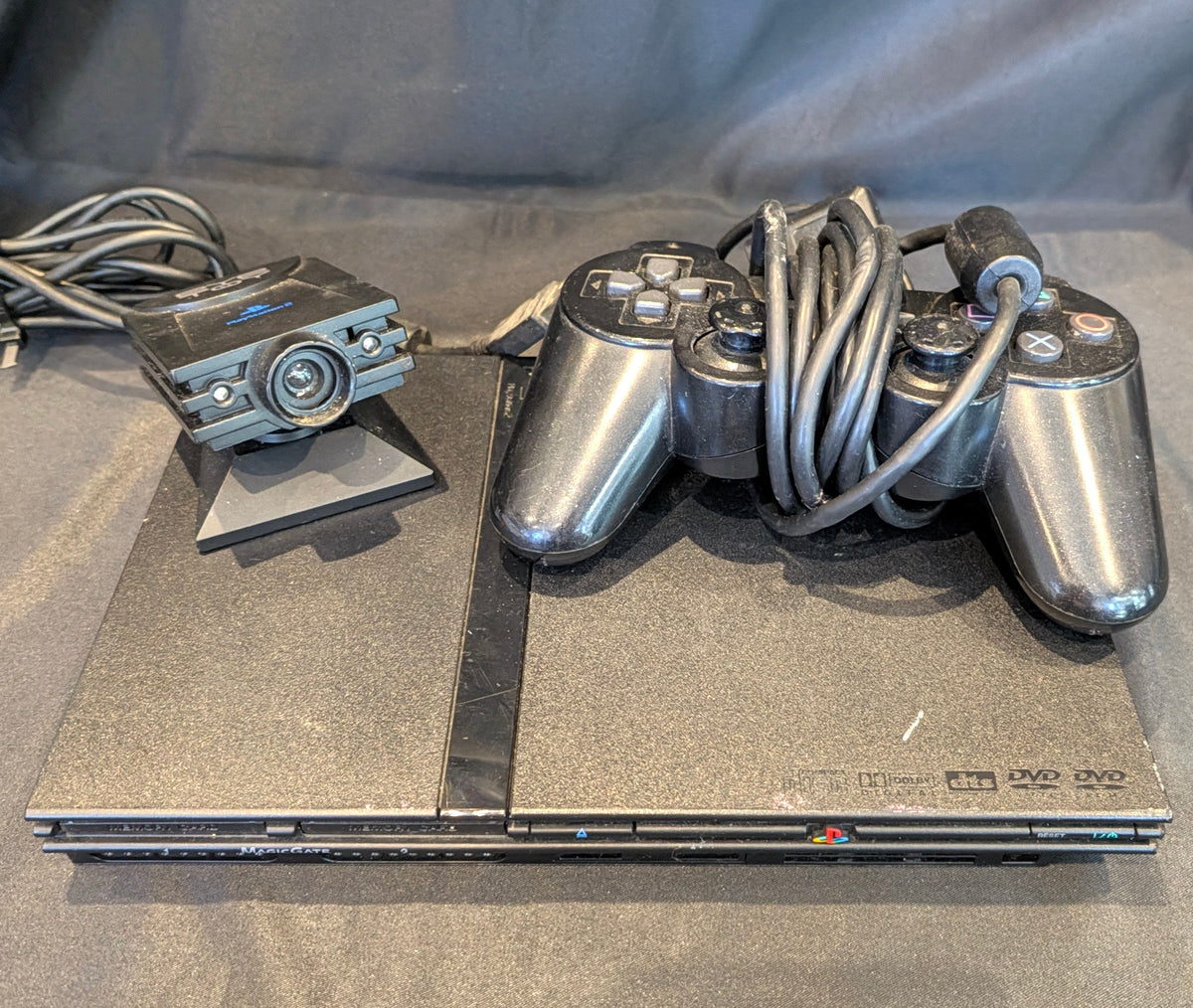 PLAY STATION 2 CONSOLE WITH EYE TOY AND STEERING WHEEL SET
