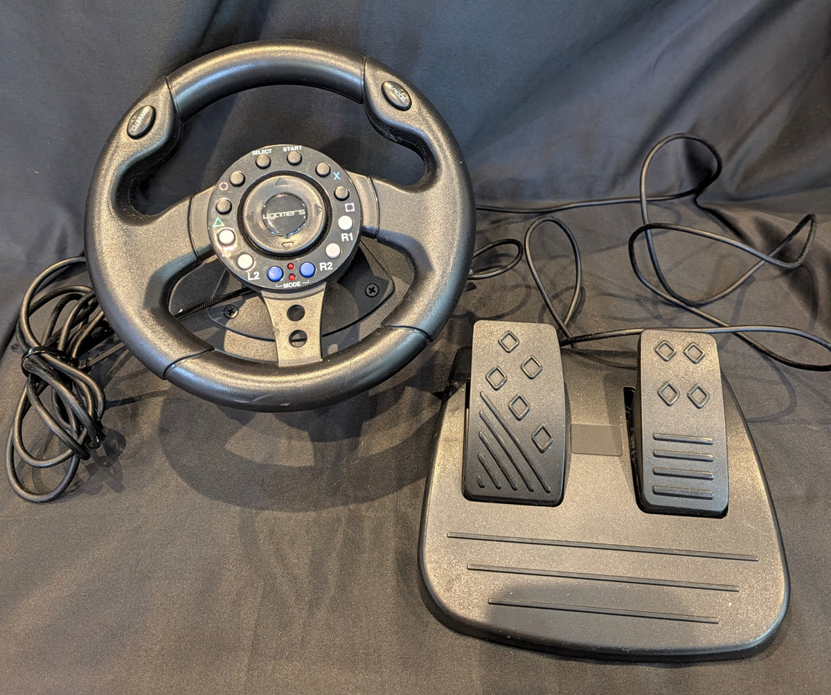 PLAY STATION 2 CONSOLE WITH EYE TOY AND STEERING WHEEL SET